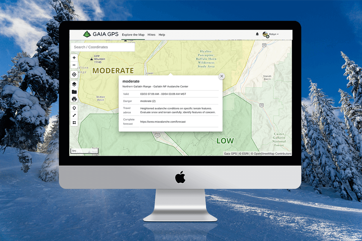 I computer monitor displaying the avalanche danger rating for an area on the topo map.  