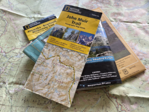 A stack of topo maps.