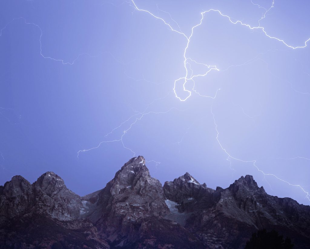 lightning striking over the Tetons in in Grand Teton National Park