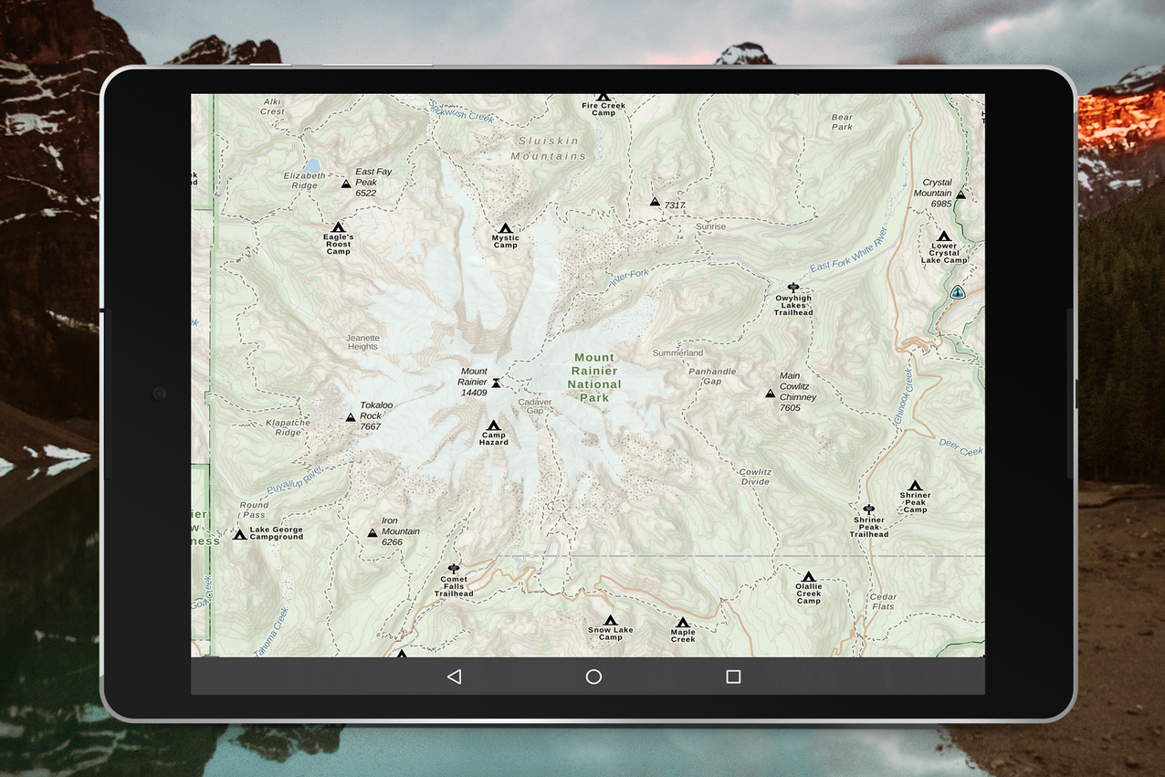 A tablet screenshot of Gaia Topo shows the peaks, campsites, and trails in Mount Rainer National Park.