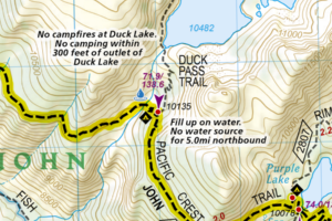 NatGeo maps showing handwritten notes on the trail.